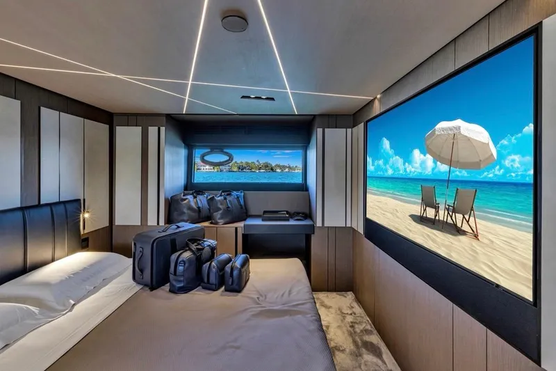 Slide: The Image of Luxurious interior of 2025 Pershing GTX 80 yacht with beach view screen. - 55