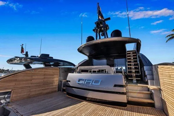Slide: The Image of Luxury Pershing GTX 80 yacht, 2025 model, docked with sleek design and wooden deck. - 6