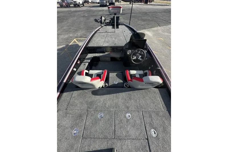 Slide: The Image of Interior view of 2026 Phoenix 921 Elite X boat with dual seats and steering console. - 12