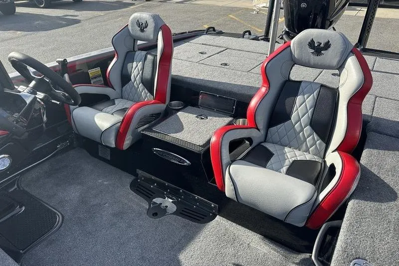 Slide: The Image of 2026 Phoenix 921 Elite X boat interior with stylish red and gray seats. - 8