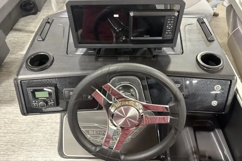 Slide: The Image of Steering console of 2026 Bennington 22 MFB boat with modern controls and display. - 10