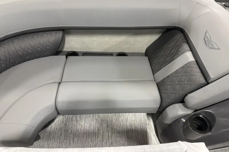 Slide: The Image of Luxurious seating in 2026 Bennington 22 MFB boat with gray upholstery and cup holders. - 7