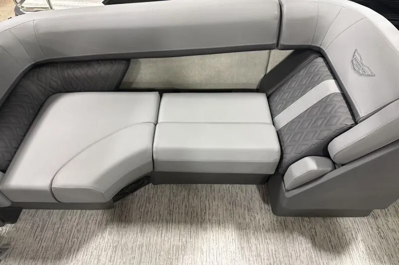 Slide: The Image of Luxurious seating on 2026 Bennington 22 MFB boat, featuring elegant gray upholstery. - 8