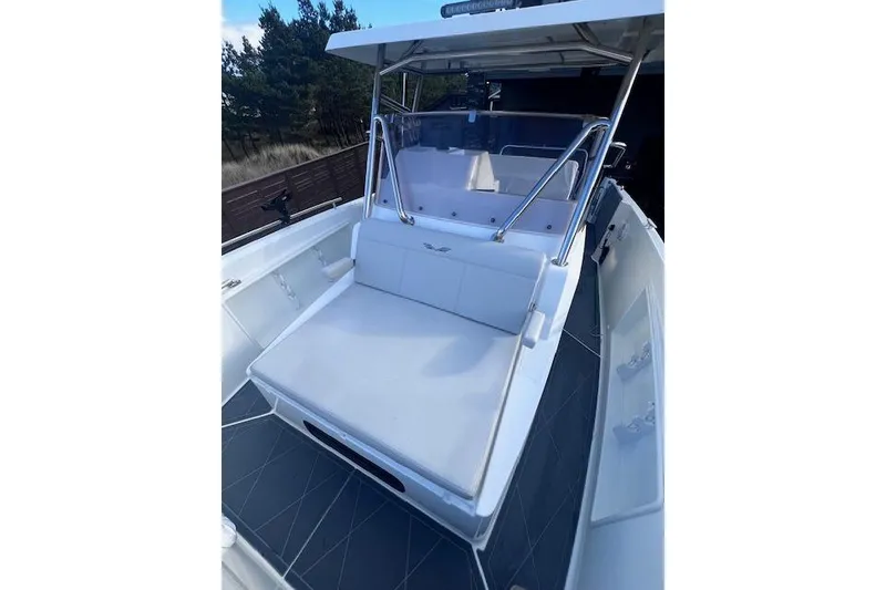 Slide: The Image of 2024 Beneteau Flyer 9 SPACEdeck boat with spacious seating and sleek design. - 14