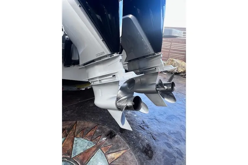 Slide: The Image of 2024 Beneteau Flyer 9 SPACEdeck dual outboard motors with stainless steel propellers. - 7