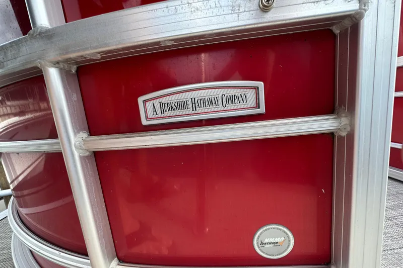 Slide: The Image of Red 2022 South Bay Pontoons 24 LE Series Tri Hull with Berkshire Hathaway branding. - 18