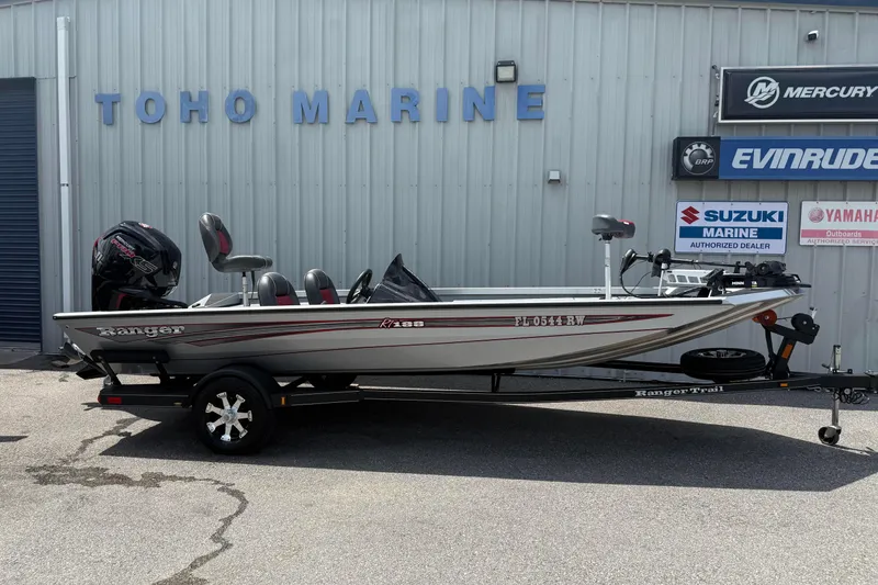 The Image of 2018 Ranger RT188 boat at Toho Marine dealership, featuring Suzuki and Yamaha signage. - 1