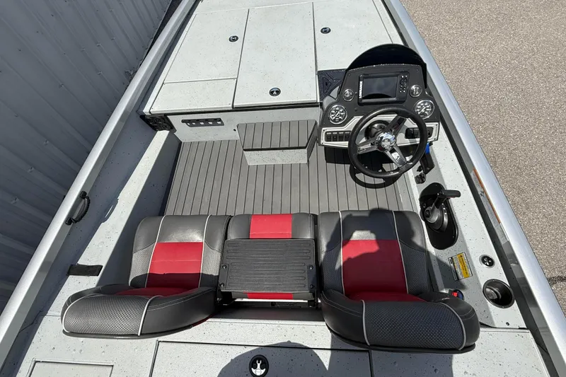 Slide: The Image of 2018 Ranger RT188 boat interior with dual seats and steering console. - 12