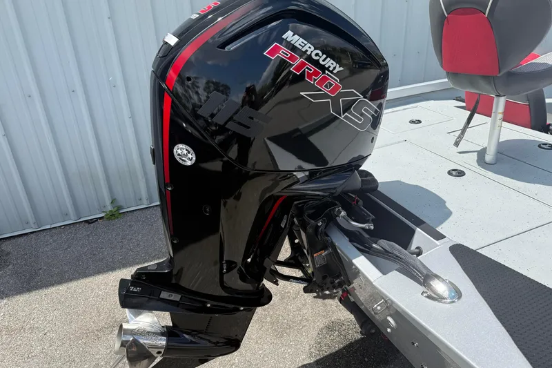 Slide: The Image of 2018 Ranger RT188 boat with Mercury Pro XS outboard motor, docked on a sunny day. - 4