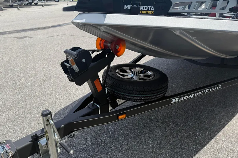 Slide: The Image of 2018 Ranger RT188 boat trailer with spare tire and Minn Kota Fortrex motor. - 7