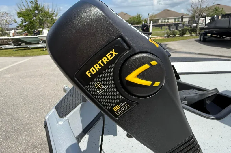 Slide: The Image of Close-up of Fortrex motor on 2018 Ranger RT188 boat, outdoors. - 8