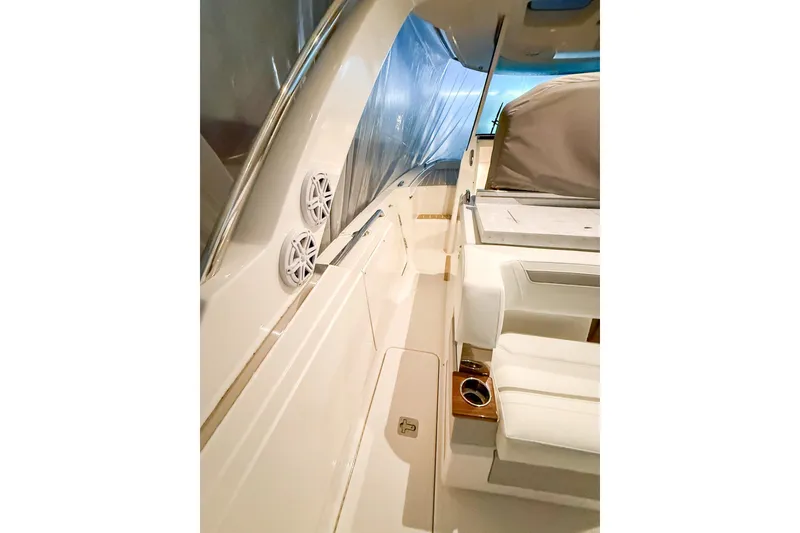 Slide: The Image of 2025 Tiara Yachts 38 LS interior with seating and speakers. - 12