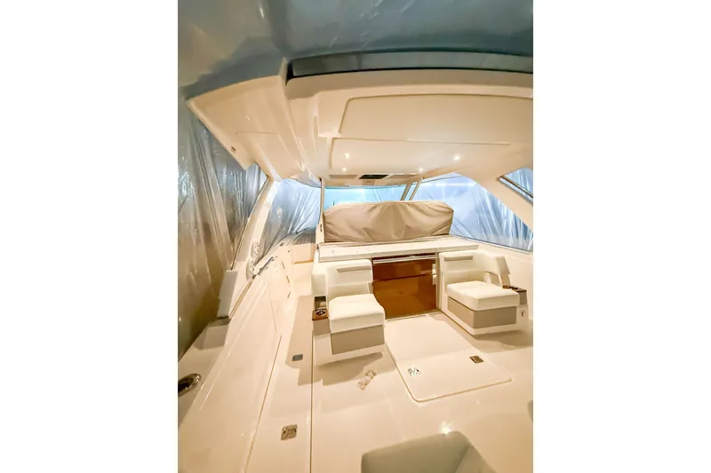 Slide: The Image of Luxurious interior of 2025 Tiara Yachts 38 LS, featuring elegant seating and modern design. - 14
