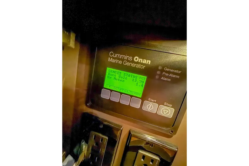 Slide: The Image of Cummins Onan marine generator display on 2025 Tiara Yachts 38 LS. - 24