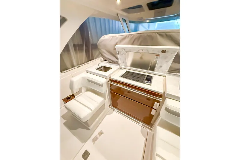 Slide: The Image of Luxurious interior of 2025 Tiara Yachts 38 LS featuring sleek seating and modern amenities. - 3
