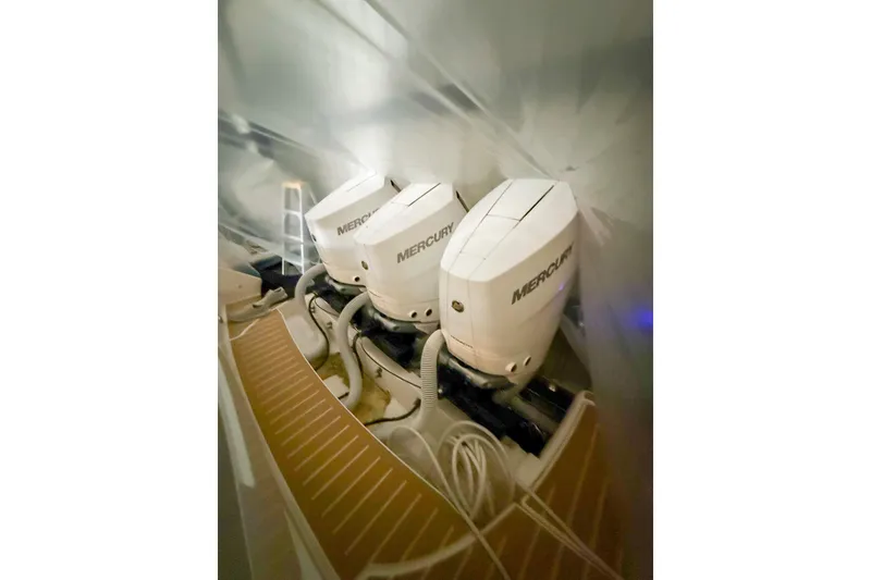 Slide: The Image of Triple Mercury outboard engines on a 2025 Tiara Yachts 38 LS. - 8