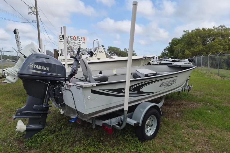The Image of 2018 Smoker Craft Angler 16 SC boat with Yamaha outboard motor on trailer. - 1
