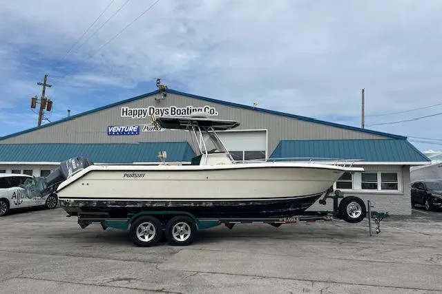 The Image of 2001 Pursuit 2670 Cuddy Console boat on trailer at Happy Days Boating Co. - 0