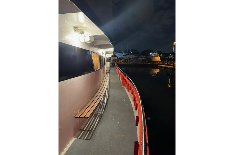 Slide: The Image of Night view of a Custom Commercial Steel 100 boat deck, 1985 model. - 14