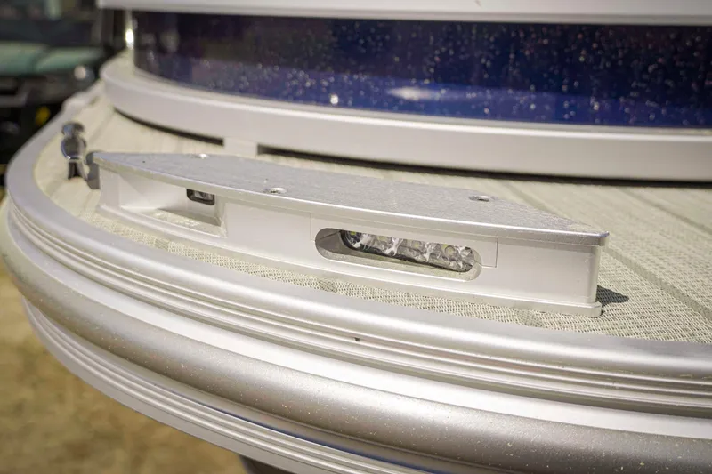 Slide: The Image of Close-up of 2025 SunCatcher Fusion 324SS boat detail with LED light. - 14