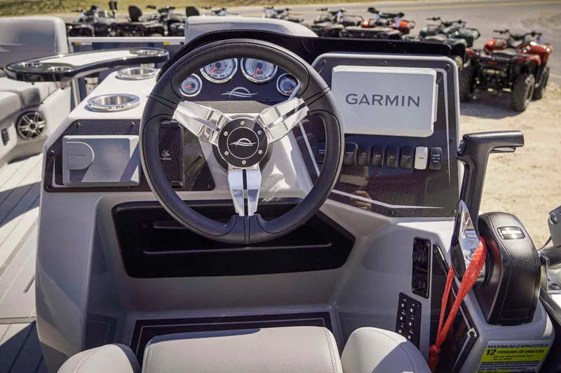 Slide: The Image of Steering console of 2025 SunCatcher Fusion 324SS boat with Garmin navigation system. - 17