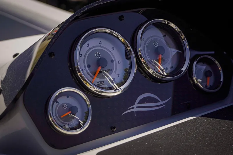 Slide: The Image of Dashboard of 2025 SunCatcher Fusion 324SS boat with gauges and controls. - 20