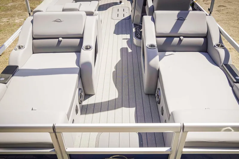 Slide: The Image of Luxurious SunCatcher Fusion 324SS boat interior with plush seating, 2025 model. - 22