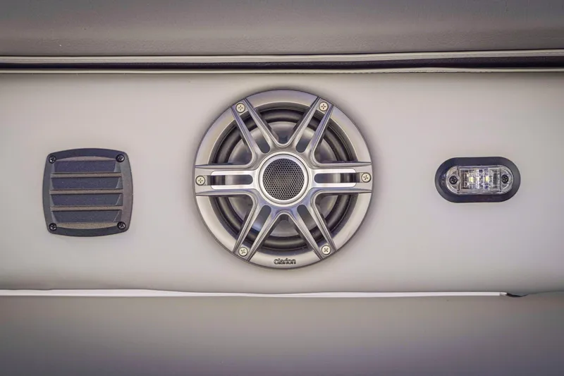 Slide: The Image of 2025 SunCatcher Fusion 324SS audio system with speaker and light detail. - 30