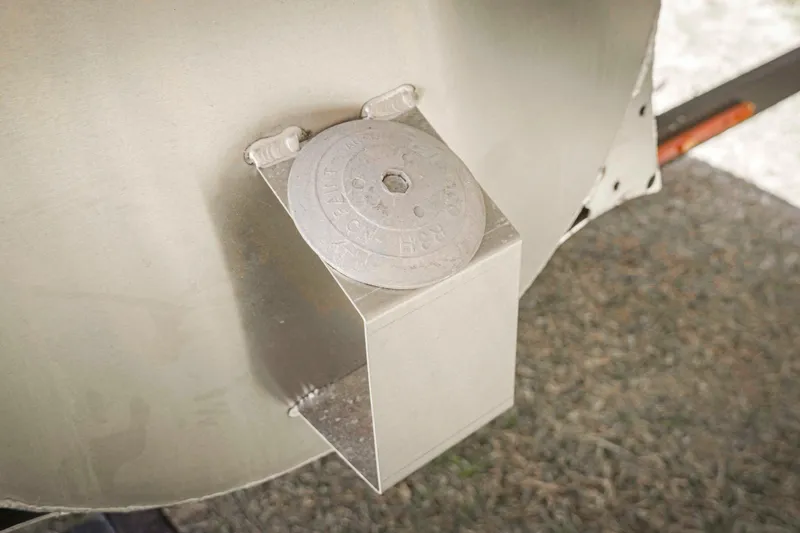 Slide: The Image of Close-up of SunCatcher Fusion 324SS 2025 boat component, featuring a metal bracket. - 31