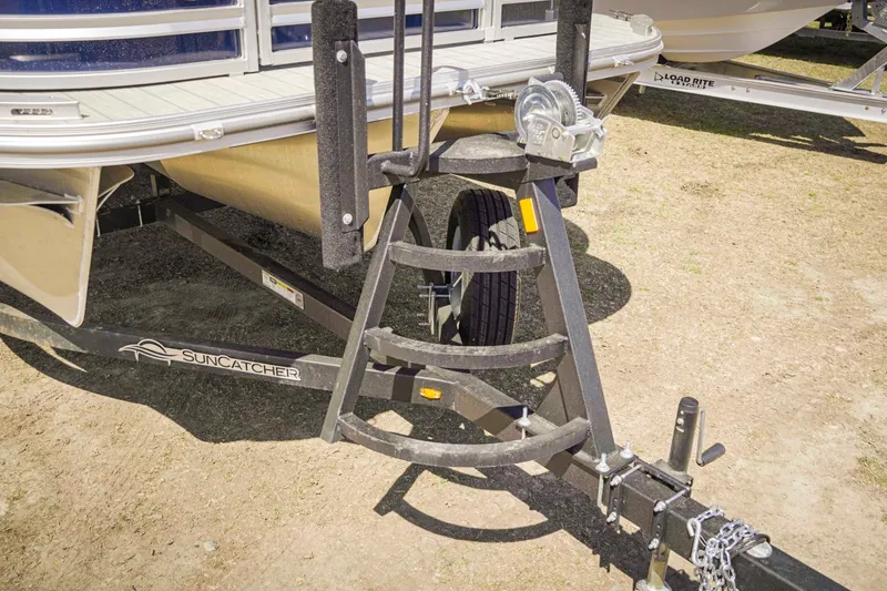 Slide: The Image of Trailer hitch of 2025 SunCatcher Fusion 324SS boat on display. - 8