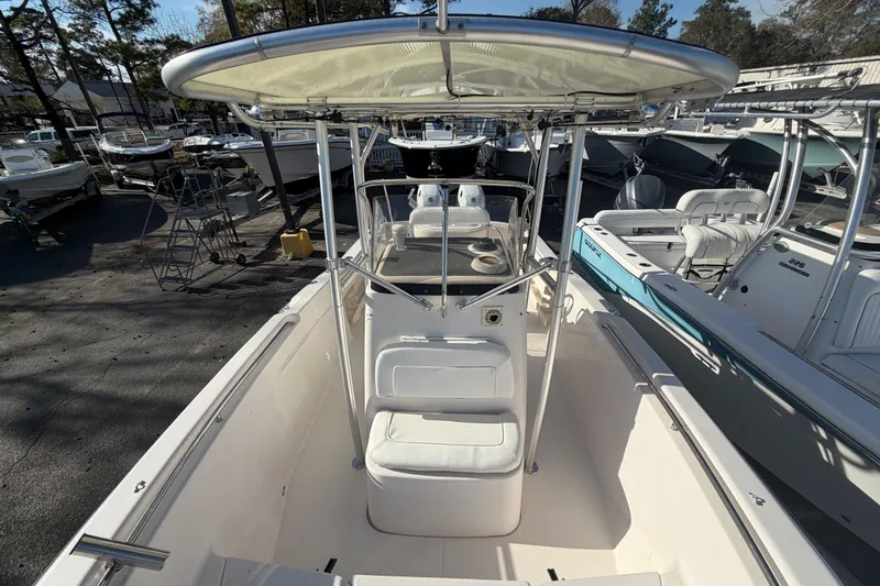 Slide: The Image of 2001 Grady-White Advance 247 boat on water, featuring center console and seating. - 12