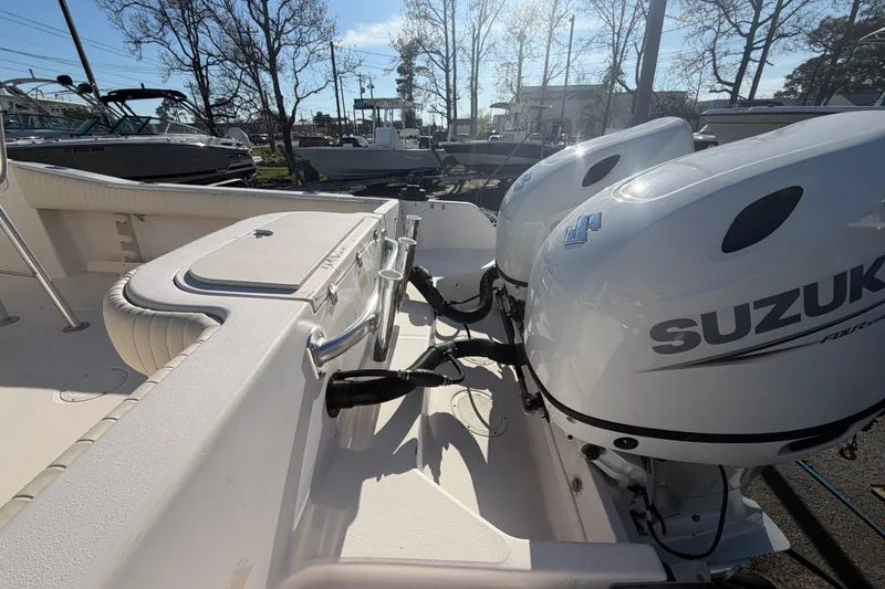 Slide: The Image of 2001 Grady-White Advance 247 boat with dual Suzuki outboard motors. - 5
