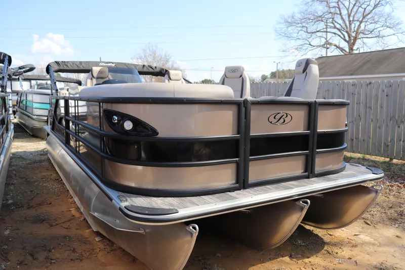The Image of 2026 Bentley Pontoons Legacy 223 DL Navigator, luxury pontoon boat in outdoor setting. - 0