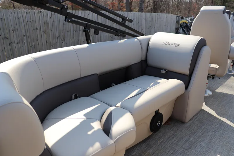Slide: The Image of 2026 Bentley Pontoons Legacy 223 DL Navigator with luxurious seating and elegant design. - 8