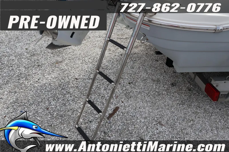 Slide: The Image of Pre-owned 2023 Stingray 212 SC boat with ladder, contact Antonietti Marine. - 10