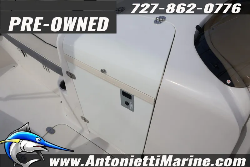 Slide: The Image of Pre-owned 2023 Stingray 212 SC boat interior, Antonietti Marine contact details visible. - 25