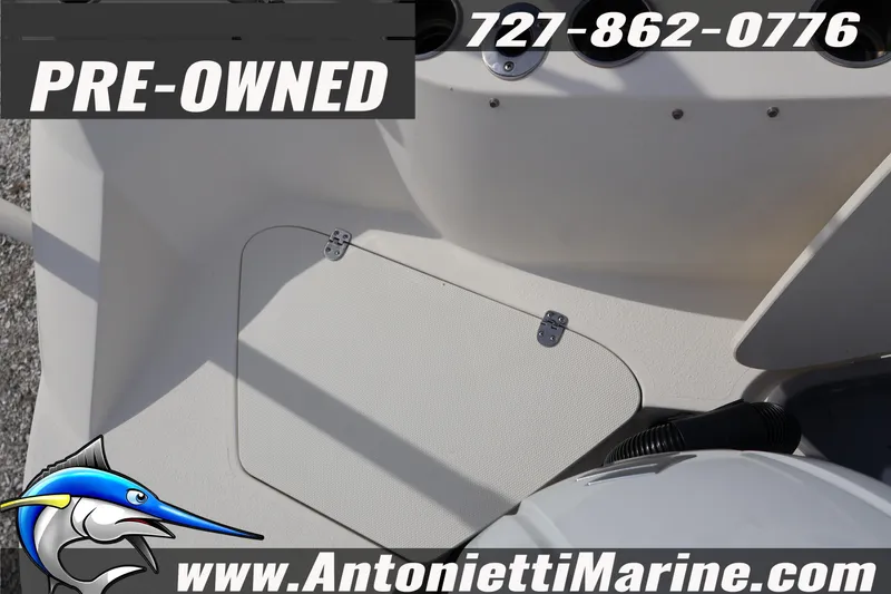 Slide: The Image of Pre-owned 2023 Stingray 212 SC boat interior at Antonietti Marine. - 32