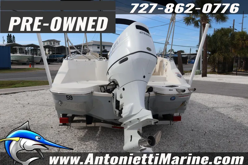 Slide: The Image of Pre-owned 2023 Stingray 212 SC boat displayed at Antonietti Marine dealership. - 5
