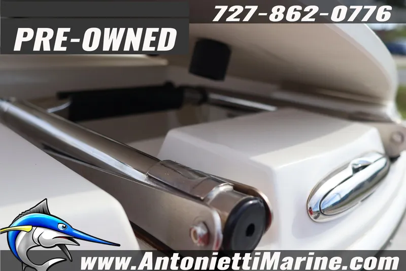 Slide: The Image of Pre-owned 2023 Stingray 212 SC boat detail with contact information and logo. - 8