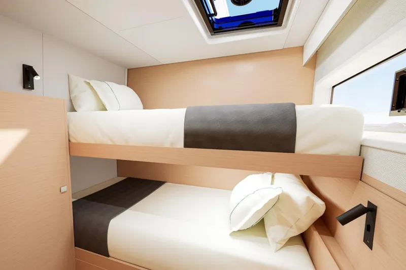 Slide: The Image of Interior of Lagoon 47 yacht with bunk beds, model year 2026. - 18