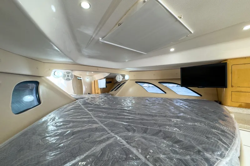 Slide: The Image of Interior cabin of a 2008 Intrepid 390 Sport Yacht with modern amenities. - 22
