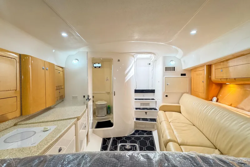 Slide: The Image of Luxurious interior of a 2008 Intrepid 390 Sport Yacht with modern amenities and elegant design. - 26