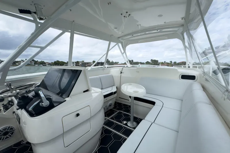 Slide: The Image of Luxurious interior of 2008 Intrepid 390 Sport Yacht with modern helm and seating area. - 36