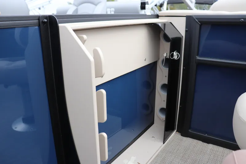 Slide: The Image of 2026 Bentley Pontoons Legacy 223 Fish N Cruise interior storage compartment detail. - 10