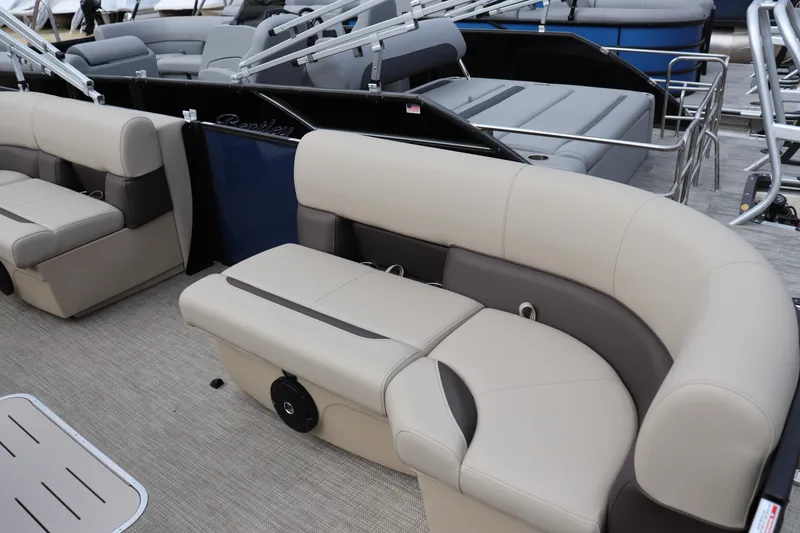 Slide: The Image of 2026 Bentley Pontoons Legacy 223 Fish N Cruise interior with beige seating and modern design. - 3