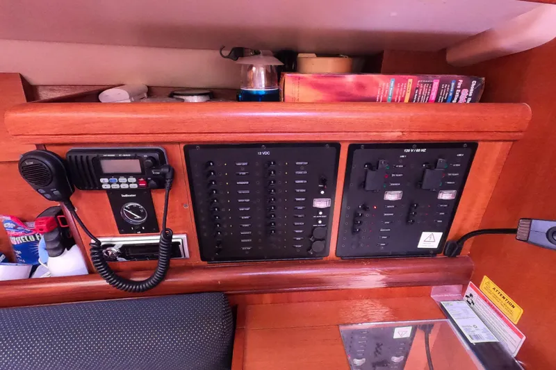 Slide: The Image of Control panel of a 2006 Hunter 33 sailboat with communication equipment. - 20