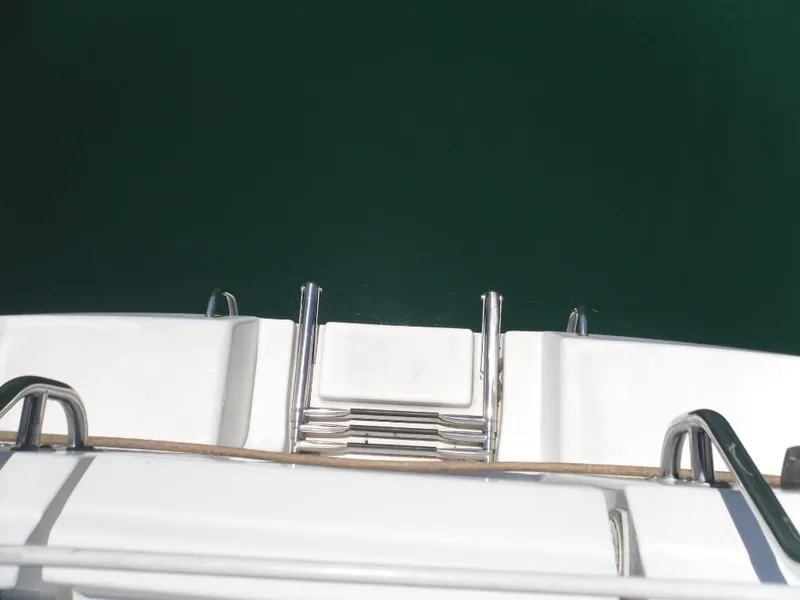 Slide: The Image of Stern view of a 2006 Hunter 33 yacht with swim ladder. - 6