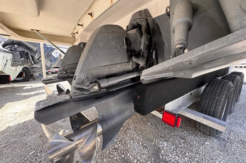 Slide: The Image of Close-up of 2015 Four Winns H290 boat propeller and drive system on a trailer. - 33