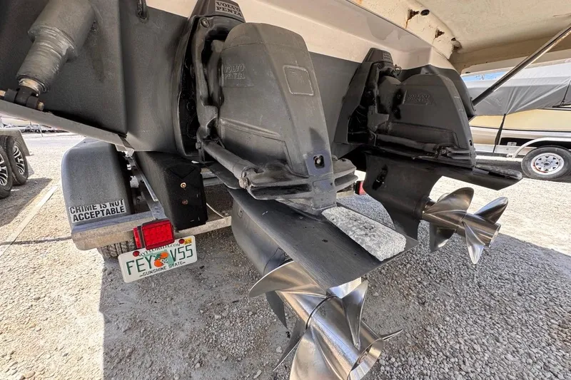 Slide: The Image of Rear view of a 2015 Four Winns H290 boat with dual Volvo Penta propellers. - 36