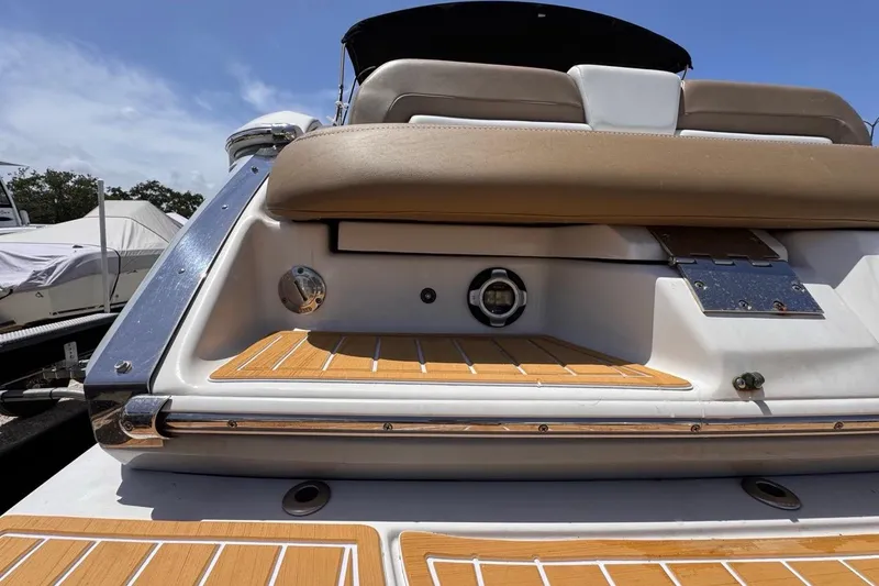 Slide: The Image of 2015 Four Winns H290 boat stern with teak decking and seating. - 39